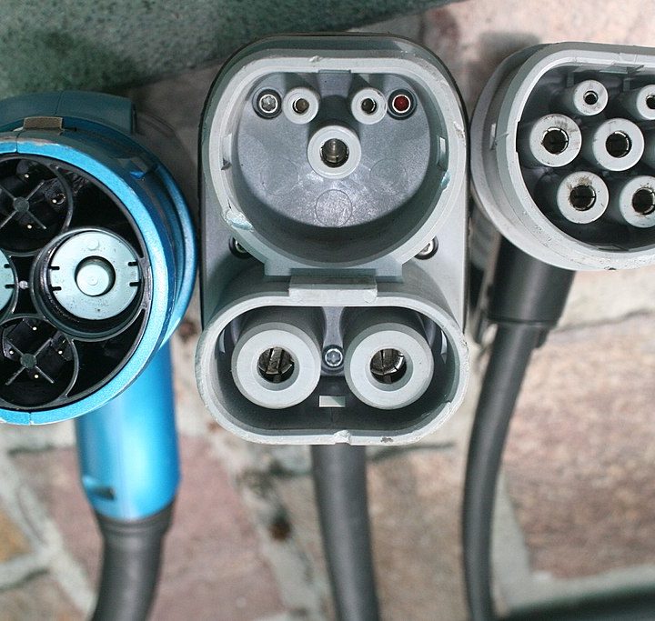 CHAdeMO, Combo2, aand Type 2 EV plugs side by side.