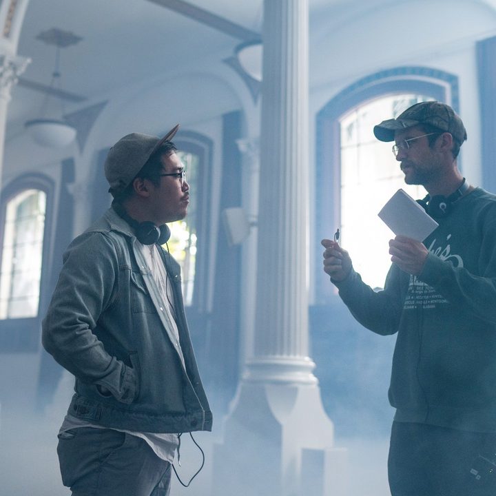 Everything Everywhere All At Once directors Dan Kwan and Daniel Scheinert discuss a scene.