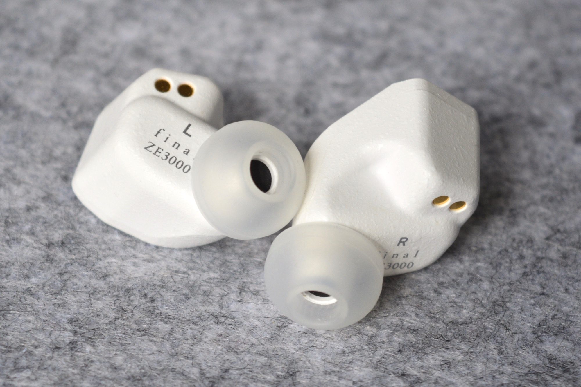 Close-up of the Final Audio ZE3000 wireless earbuds.