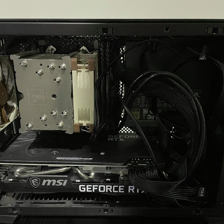 A gaming PC on a desk with an MSI graphics card inside.