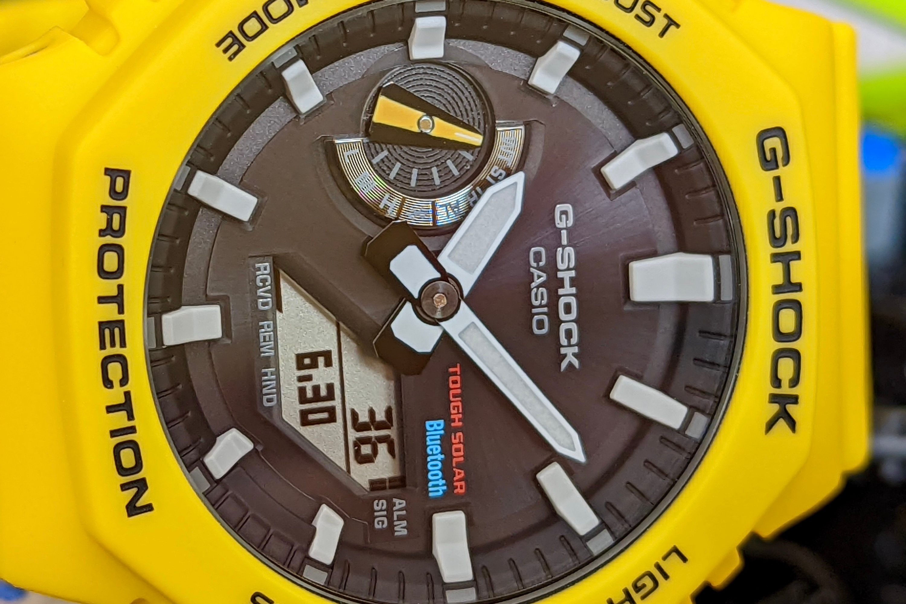 Close-up of the yellow G-Shock GA-B2100's dial.