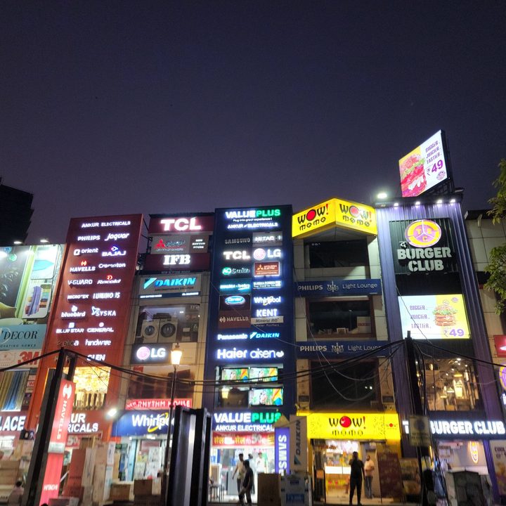 Buildings with lots of advertising hoardings.
