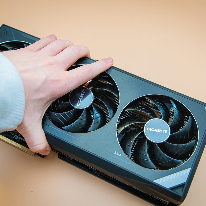 Someone grabbing the RTX 3090 Ti.