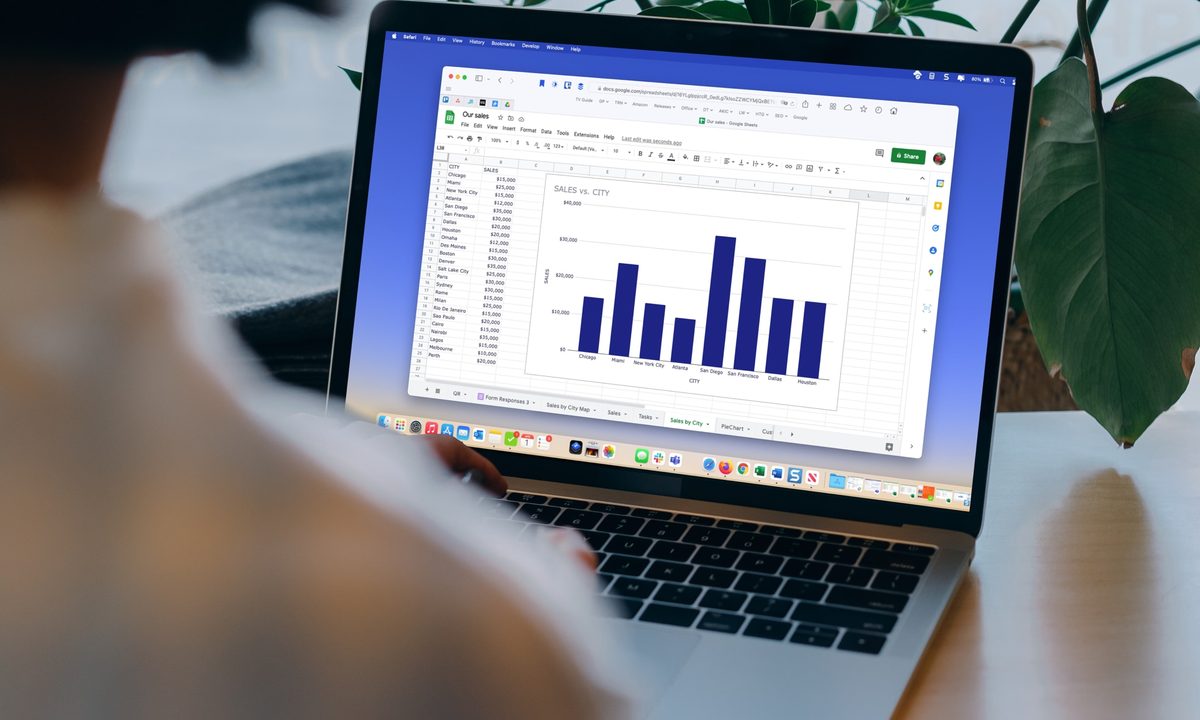 A MacBook owner using Google Sheets.