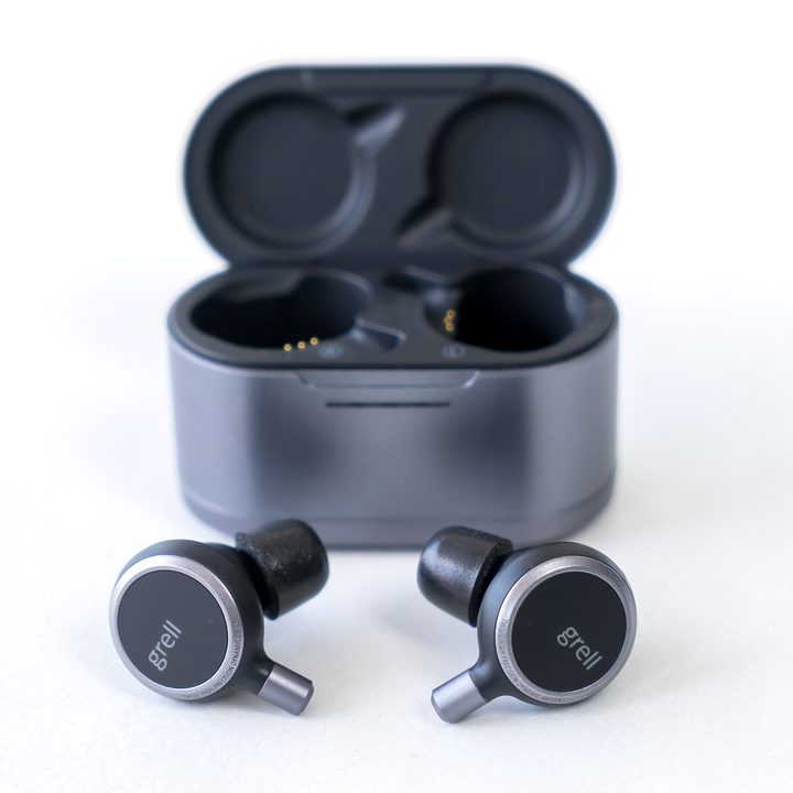 Grell TWS/1 earbuds with case in background.