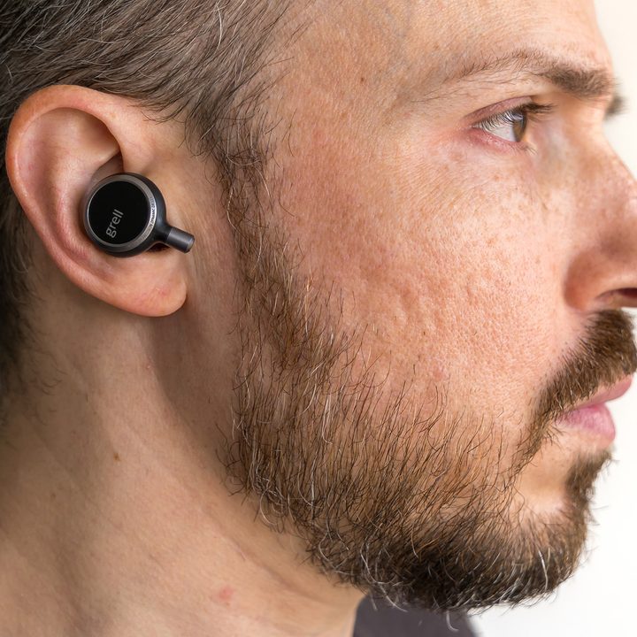 Wearing the Grell TWS/1 earbuds.