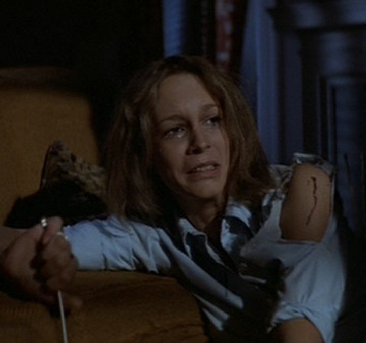 Laurie grabs a needle in Halloween.