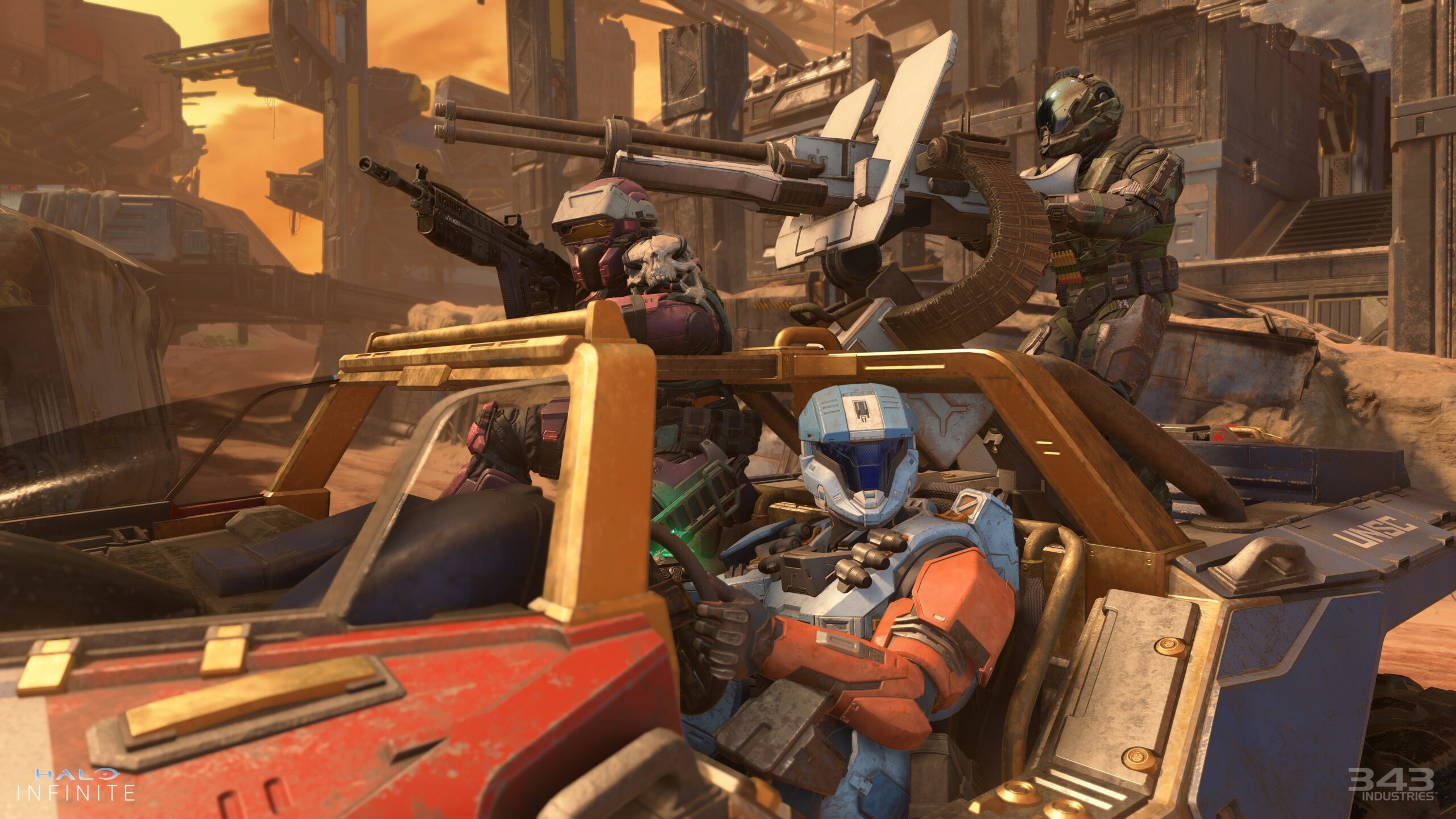 Halo Infinite screenshot of spartans riding in a warthog.