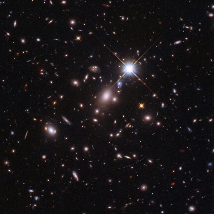 Tthe light of a star that existed within the first billion years after the Universe’s birth in the Big Bang (at a redshift of 6.2), captured by Hubble.