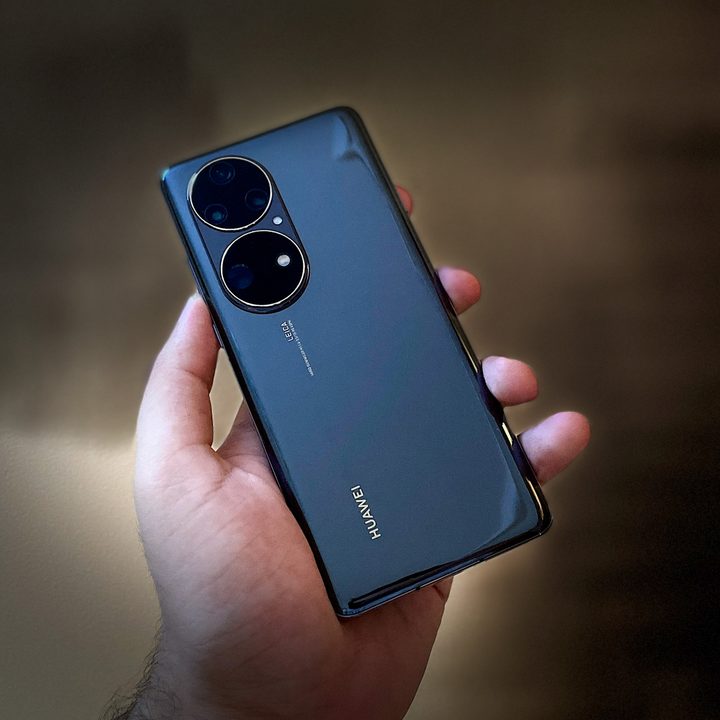 Huawei P50 Pro back panel in hands.