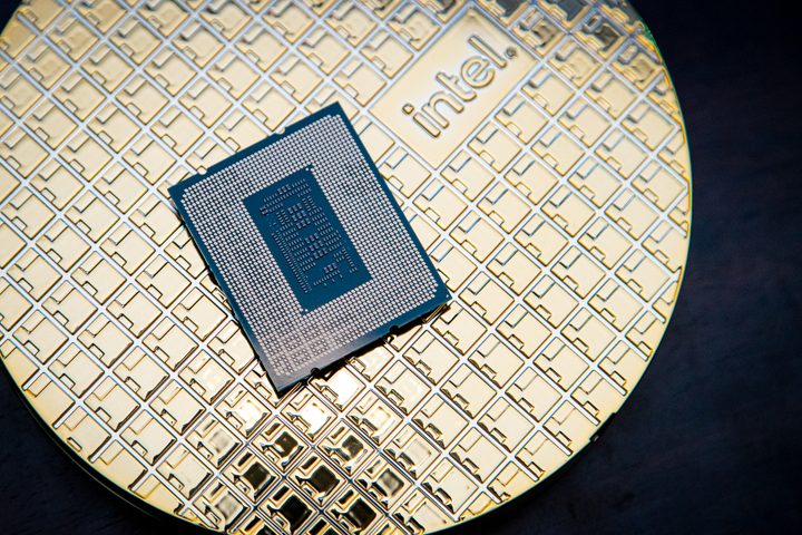 A Core i9-12900KS processor sits on its box.