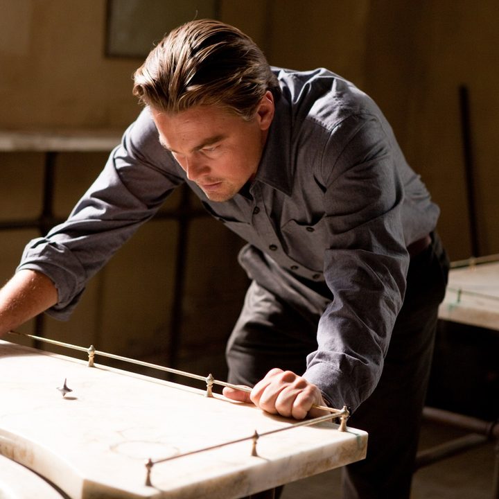 Leonardo DiCaprio watches a top spin in Inception.