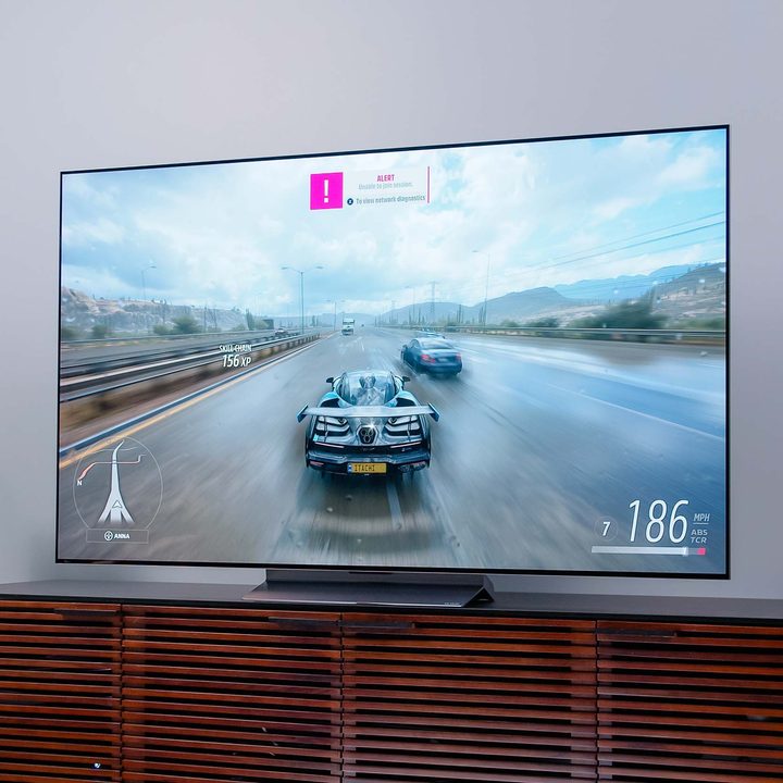 A racing video game being played on the LG C2 OLED TV.
