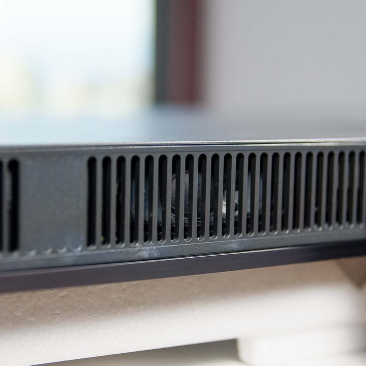 A close up on the LG C2 OLED's speakers located on the bottom of the tv.