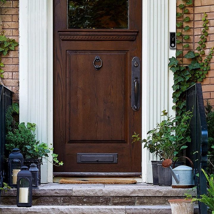 Lorex 1080p Wi-Fi Video Doorbell installed next to the front door of a home.