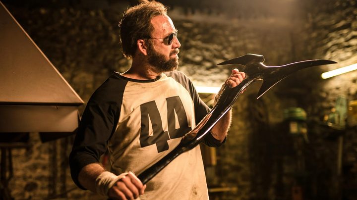 Nicolas Cage holding an axe in Mandy.
