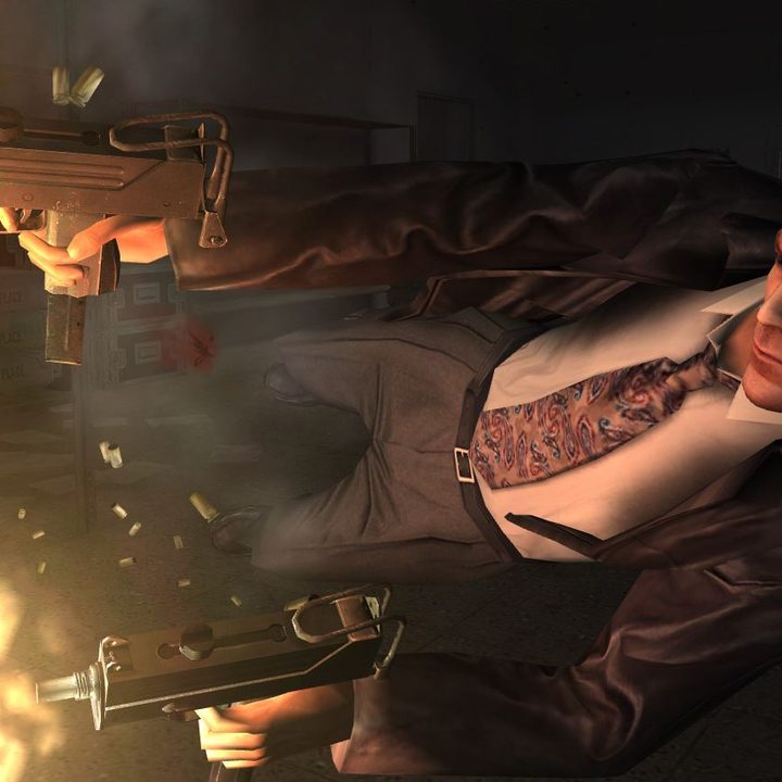 Max Payne dives while shooting two pistols in Max Payne 2: The Fall of Max Payne.