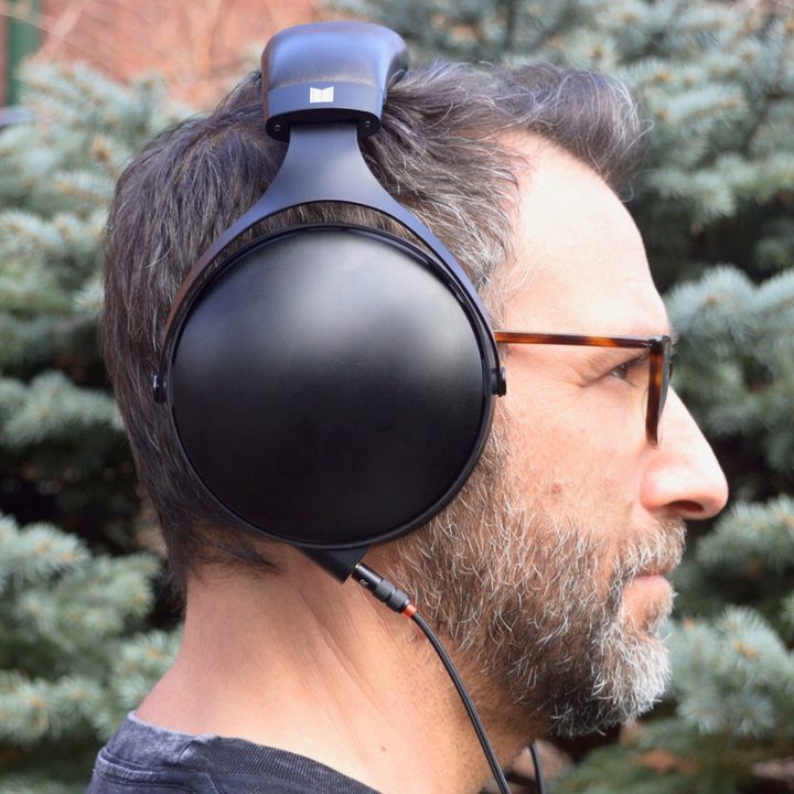 Side view of man wearing Monoprice Monolith M1070C.
