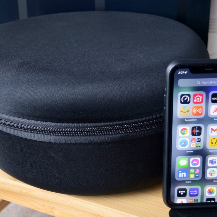 Monoprice Monolith M1070C storage case exterior seen next to an iPhone 11.
