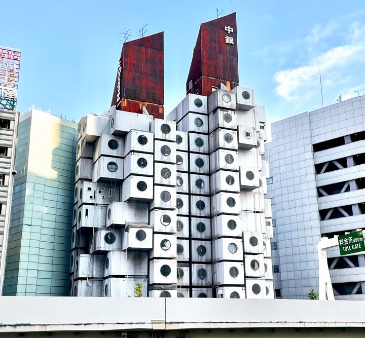 The exterior of the Nakagin Capsule Tower in Tokyo, Japan.