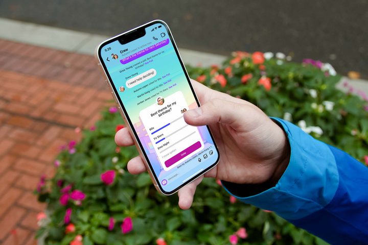 An iPhone 13 showcasing Instagram's new messaging features.