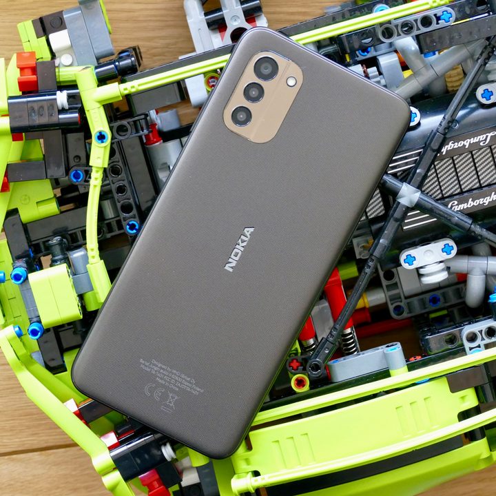 Nokia G11 rear panel, resting on Lego.