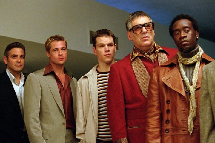 Danny Ocean stands with his crew in Ocean's Eleven.