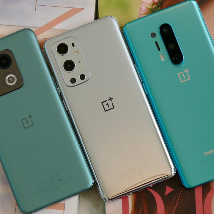 OnePlus 10 Pro, OnePlus 9 Pro, and OnePlus 8 Pro seen from the back.