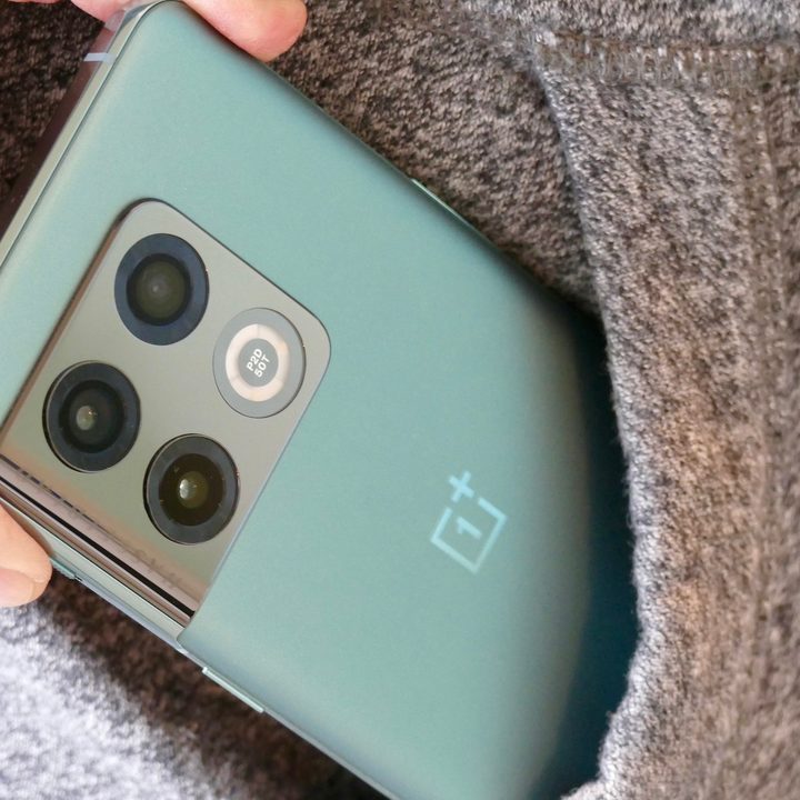 OnePlus 10 Pro being taken out of a pocket.