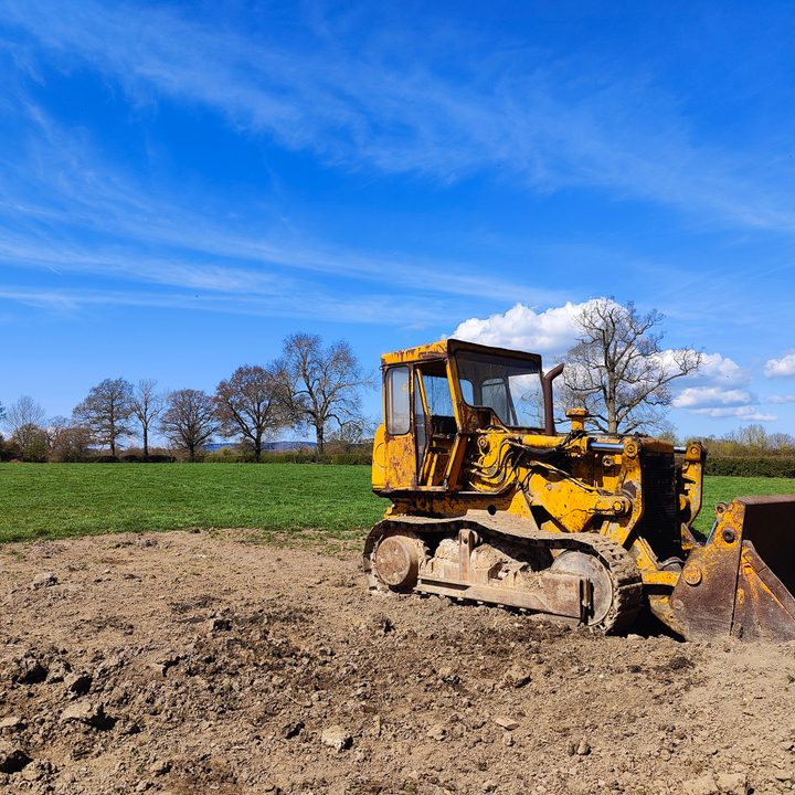 A digger in a field shot with the OnePlus 10 Pro main camera photo.