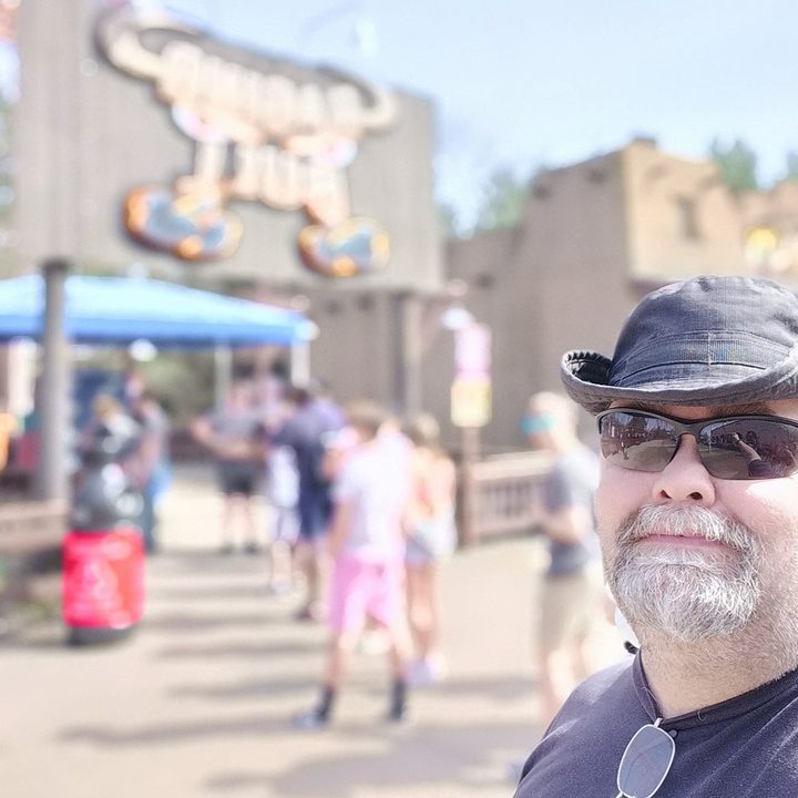 Selfie in front on the Ragin Bull ride in portrait mode.