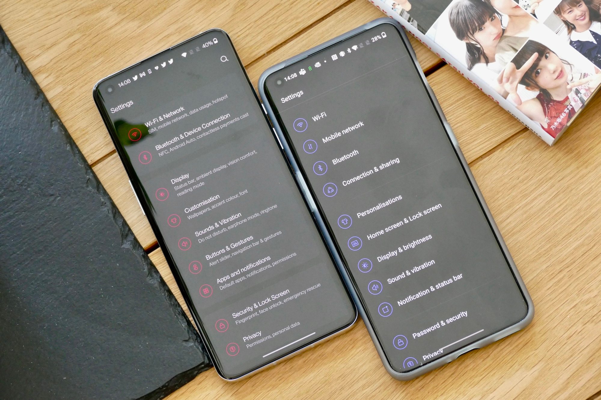 OxygenOS 11 and OxygenOS 12's Settings pages.