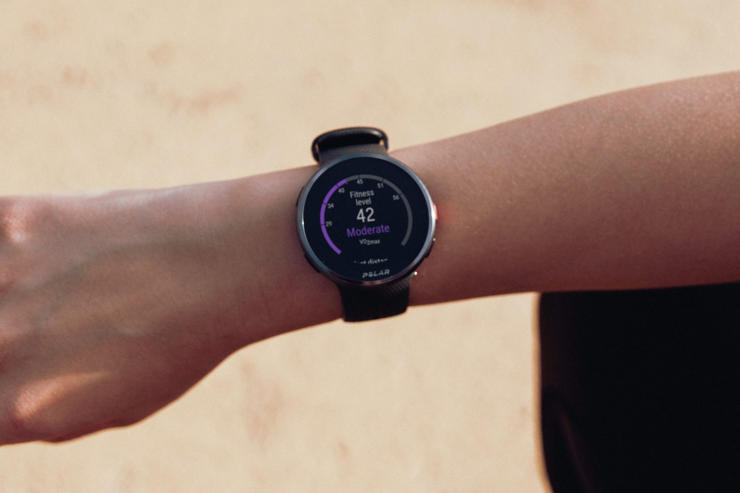 Polar Pacer Pro on a persons wrist.
