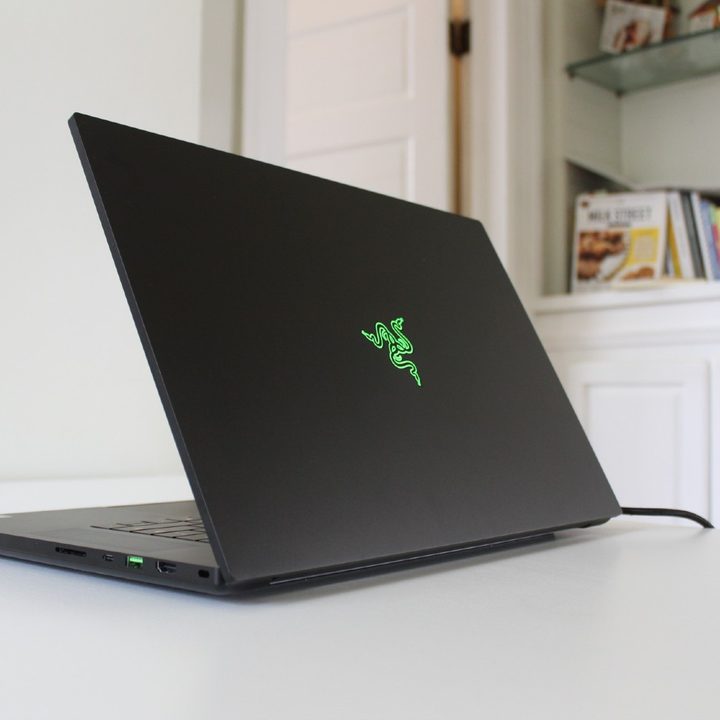 Razer Blade laptop sitting on a white countertop.