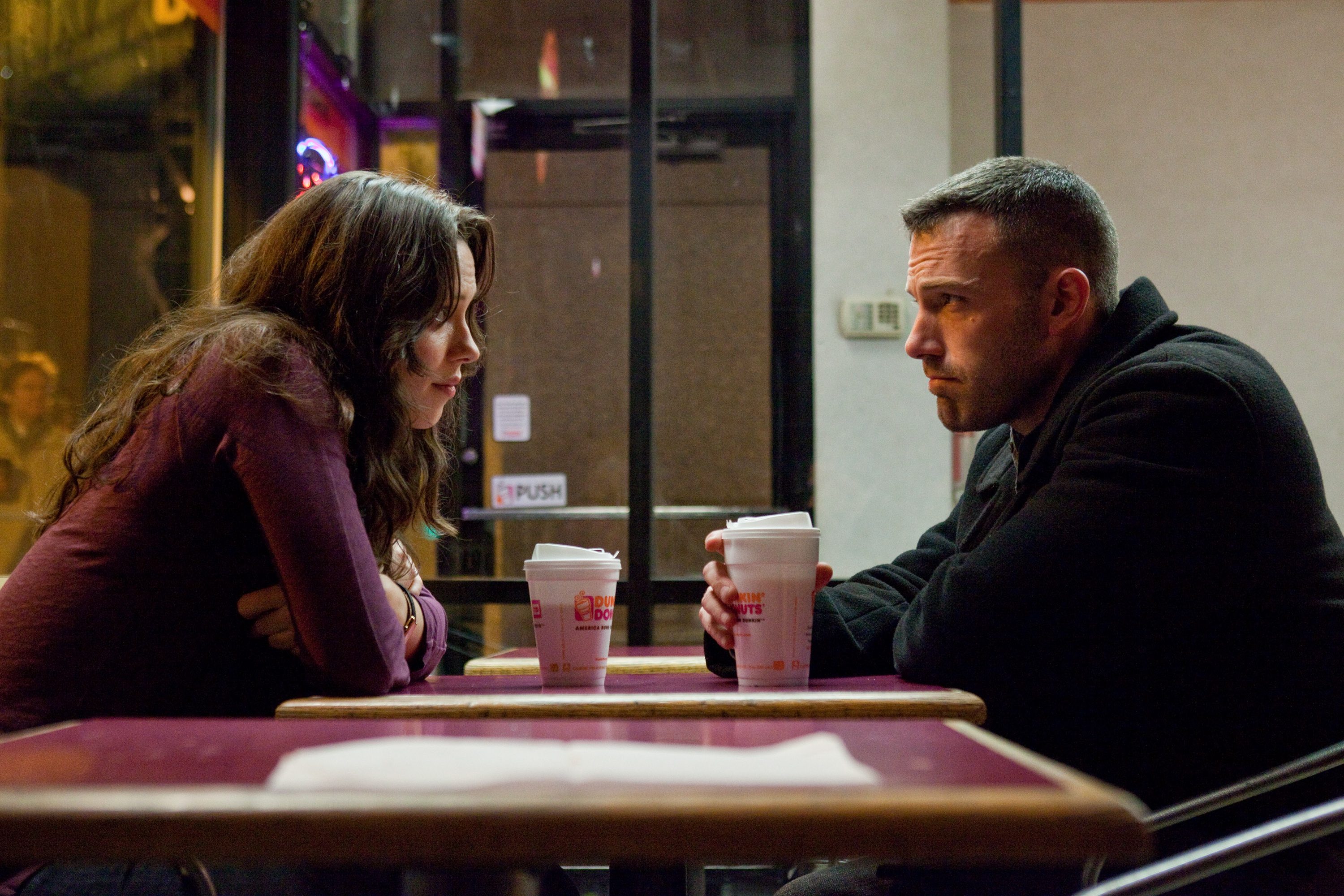Rebecca Hall sits across a table from Ben Affleck in The Town.