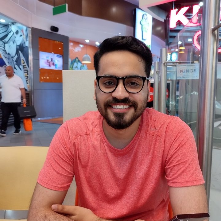 Prakhar Khanna sitting with crossed arms.