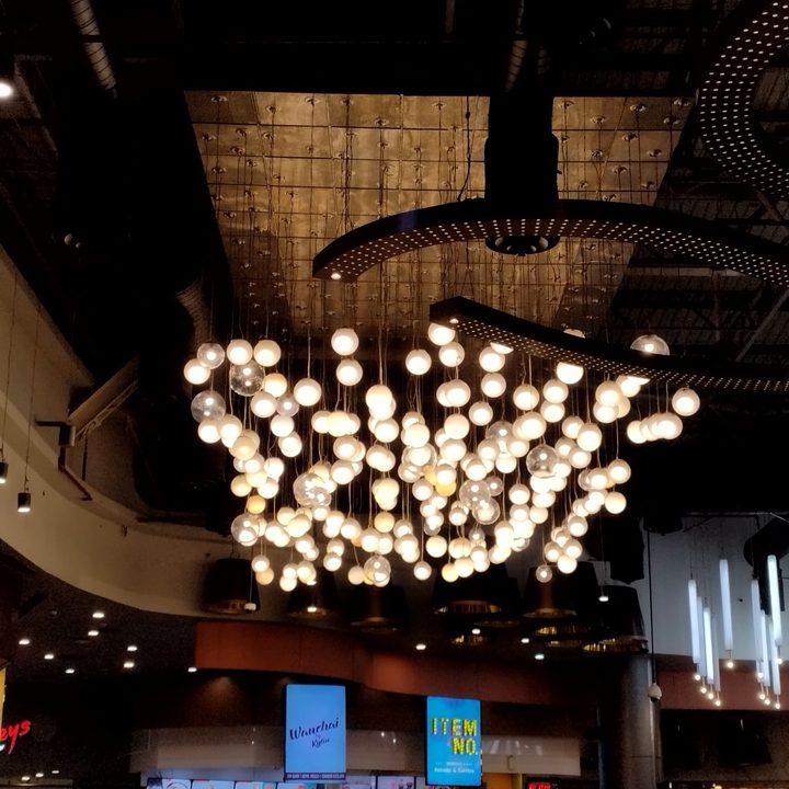 Light bulbs on the ceiling.