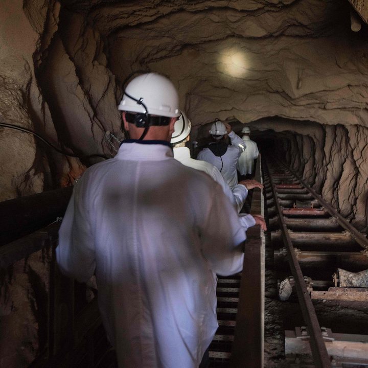 People walk through the shaft at Steenkampskraal (SKK) rare-earth mine.
