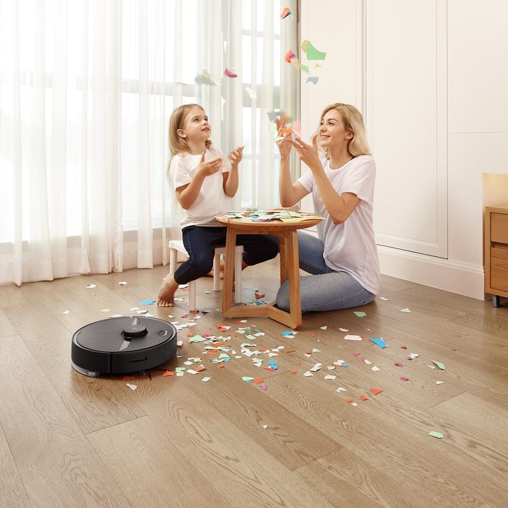 Roborock S6Pure cleaning while Mom and daughter play.