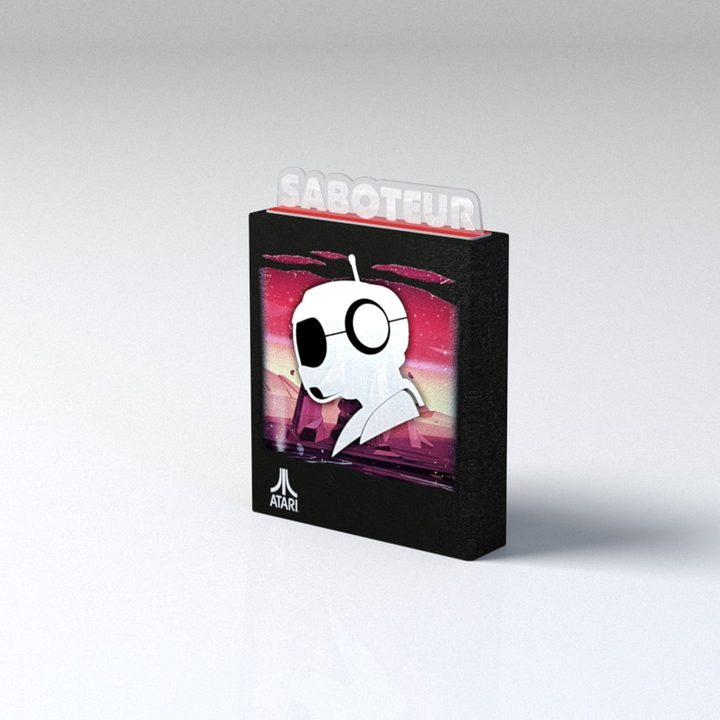 An AtariXP cartridge of Saboteur sits in a white room.