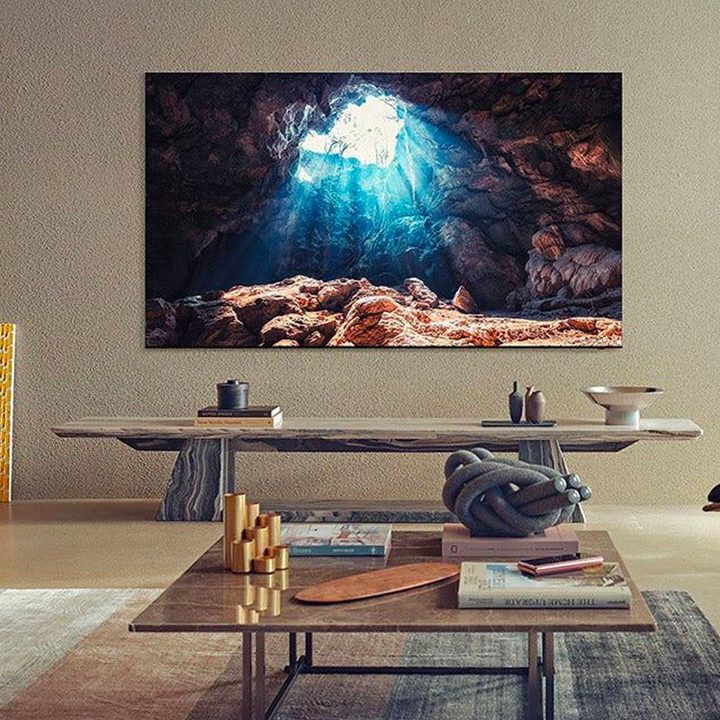 A Samsung 85-inch 8K hangs on a living room wall.
