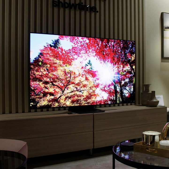 Samsung S95B OLED TV with bright image on-screen.
