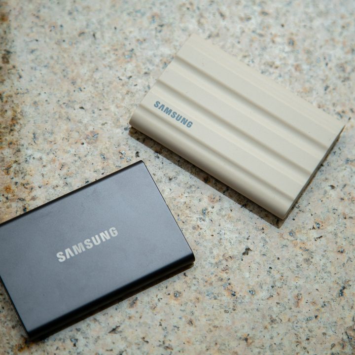 Samsung T7 and T7 Shield sitting on a table.