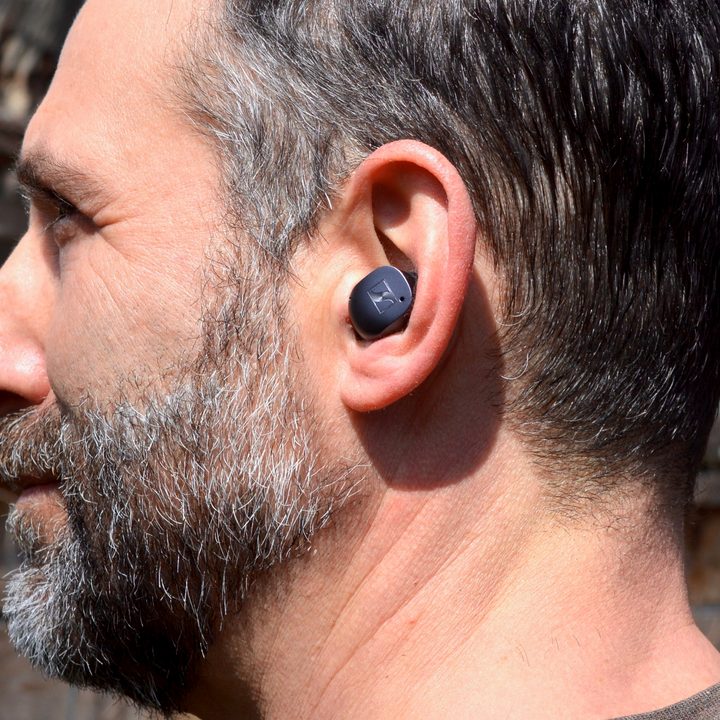 Man wearing Sennheiser Momentum True Wireless 3.