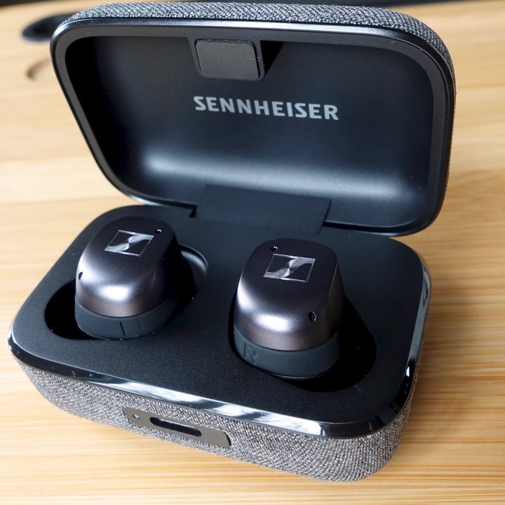 Sennheiser Momentum True Wireless 3 inside their charging case.