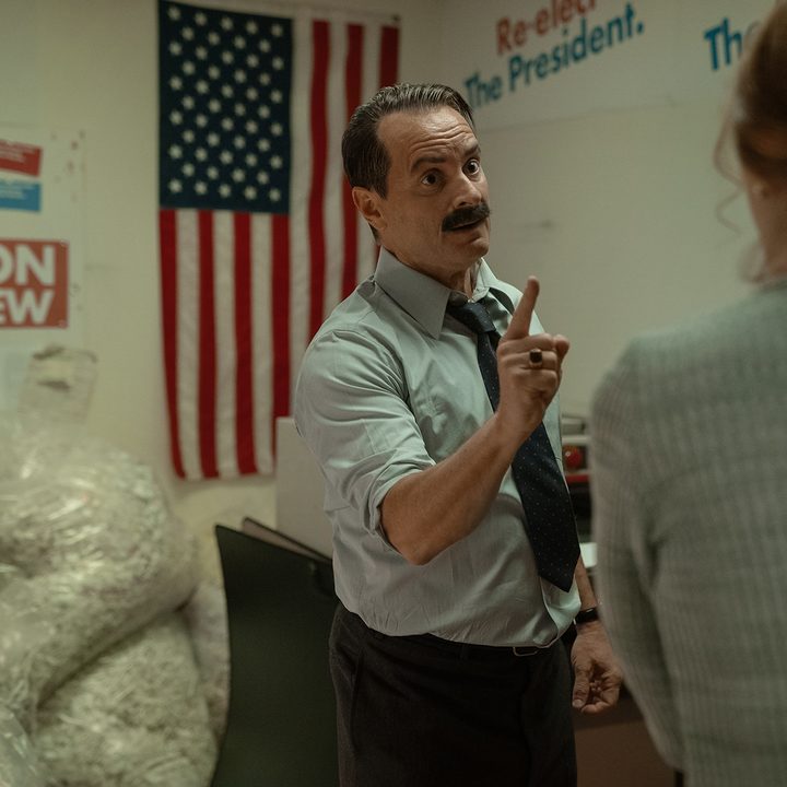 Shea Whigham points his finger at a woman in Gaslit.