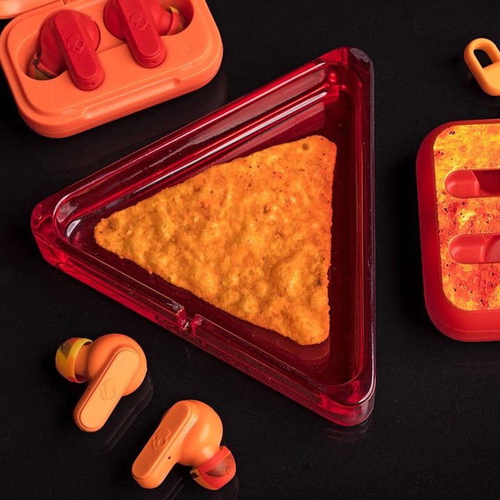 Skullcandy/Doritos limited edition 420 Dime wireless earbuds seen with the even more limited edition "dust tray."