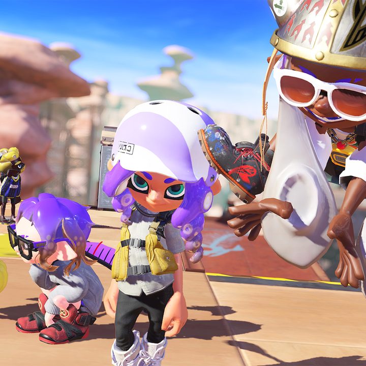 Four Splatoon 3 inklings standing together.