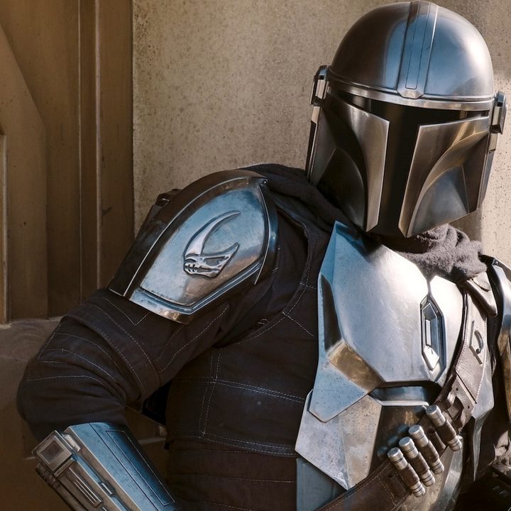Din Djarin and Grogu escape bad guys in The Mandalorian.
