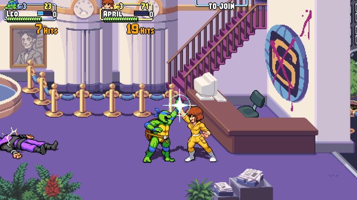 April and Leo high-five in TMNT: Shredder's Revenge